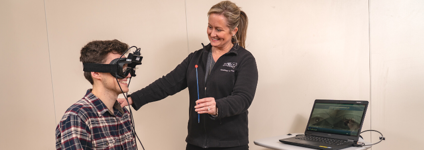 Therapist with patient during neuro-rehabilitation appointment