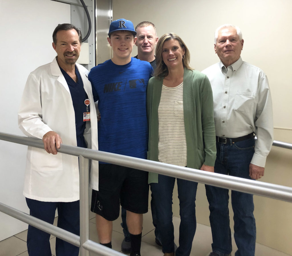 Whitaker family pictured with Dr. Kris Smith at Barrow