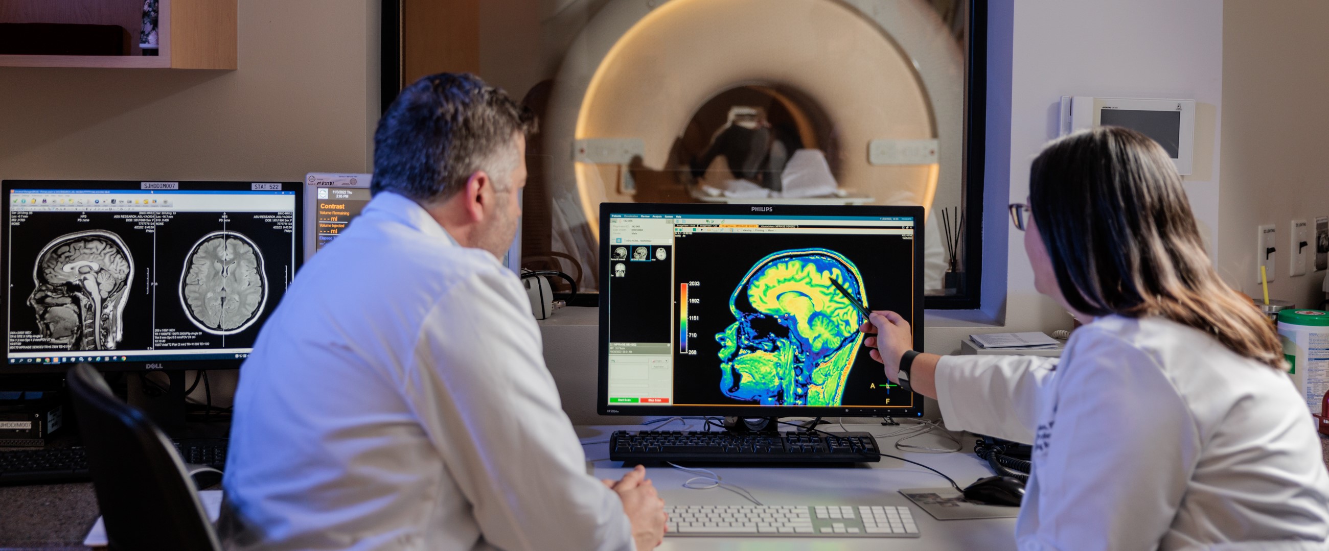 Barrow Researchers examining brain MRI scan