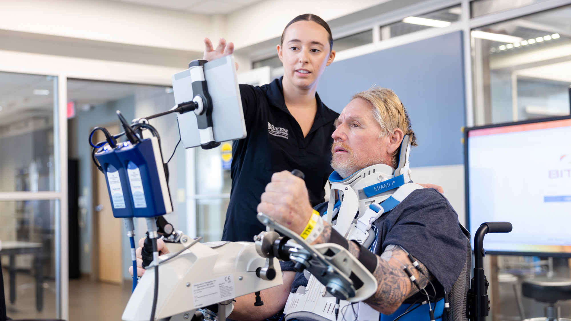Barrow patient and therapist at the Neuro-Rehabilitation Center