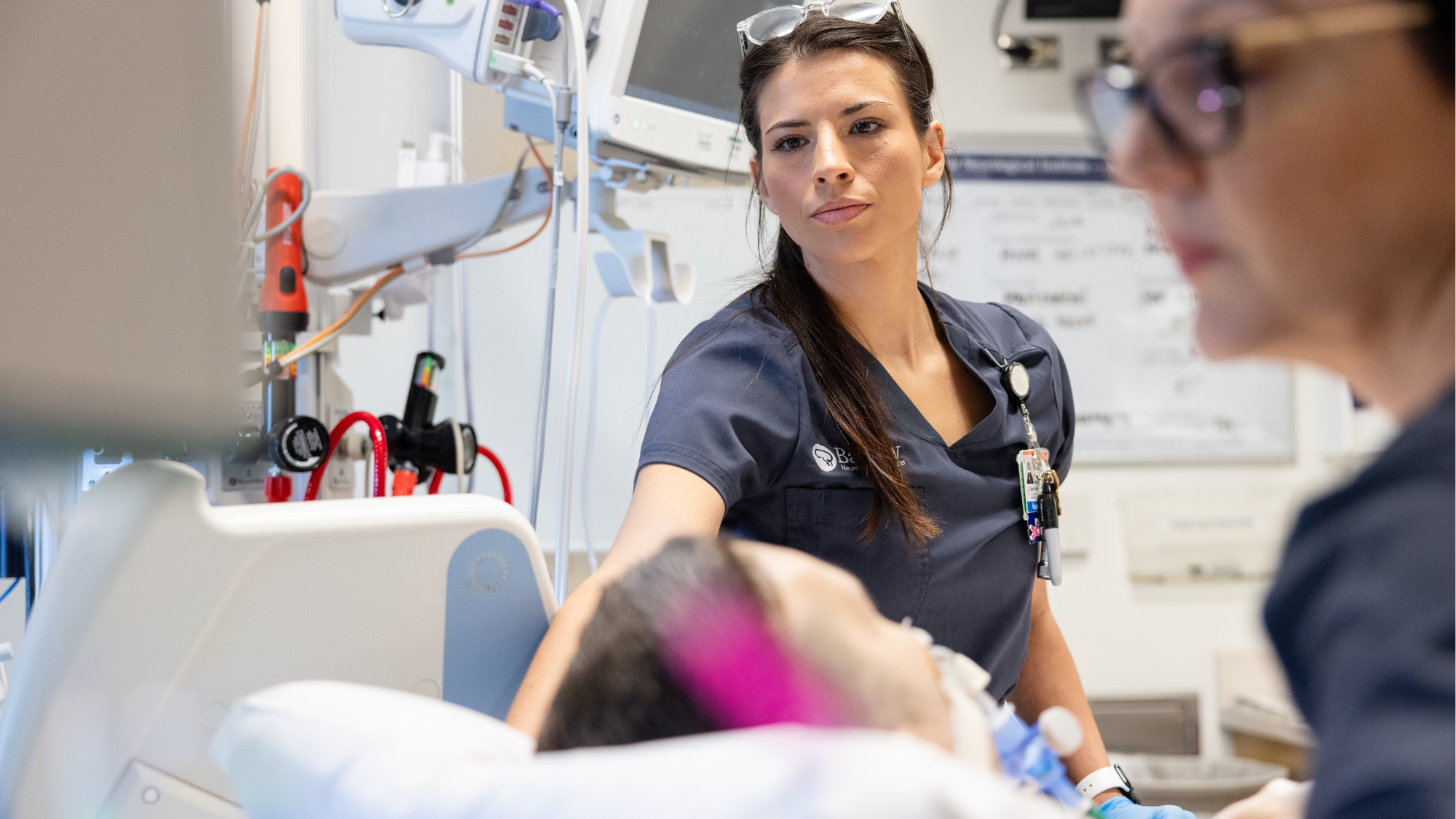 Barrow ICU nurse with patient